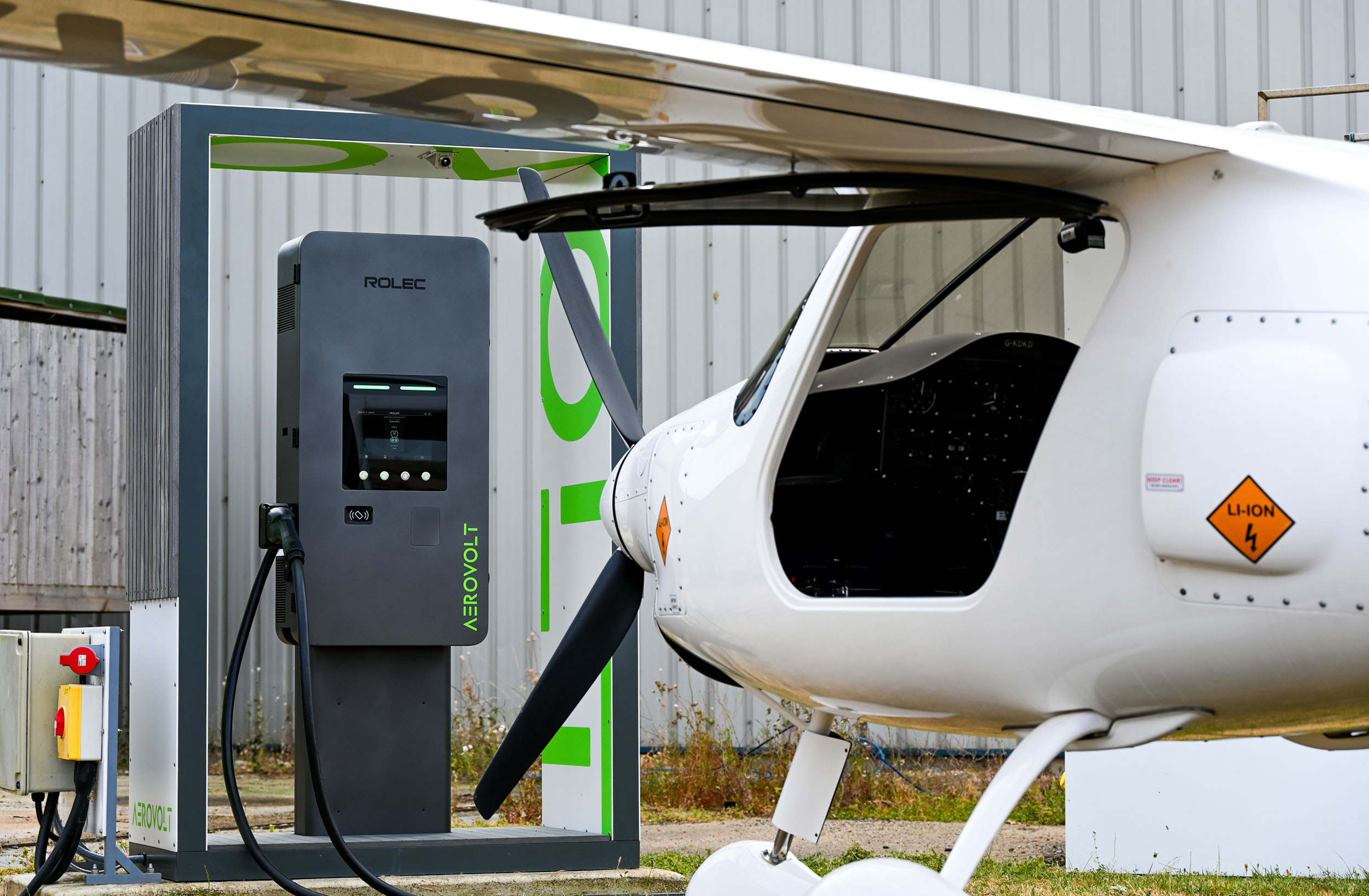 Aerovolt Rolec charger alongside an electric aircraft at Brighton City Airport